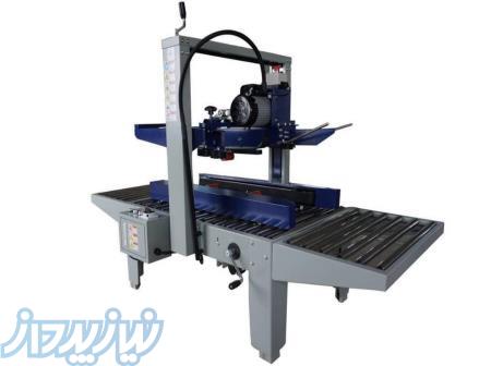 کارتن چسب زن 