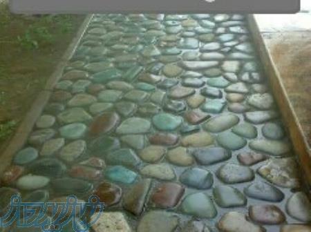 پیمانکاری واجرای سنگ لاشه مالون کف دیوار آبنما 