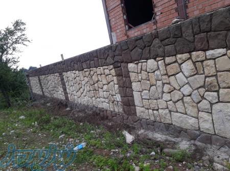 پیمانکاری اجرای سنگ لاشه مالون کف دیوار آبنما 