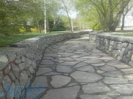 اجرای سنگ لاشه نصب سنگ لاشه کف با طرح منظم 