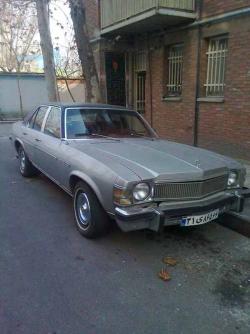 بیوک 57 b2 نقره ای تو دوزی قرمز فابریک  - تهران