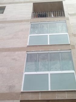 پوشش بالکن با شیشه های ریلی(تاشو 