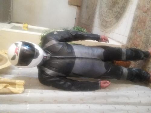 لباس چرم مشکی یه تیکه کوهان دار نو  - تهران